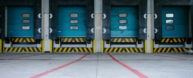 a row of blue doors