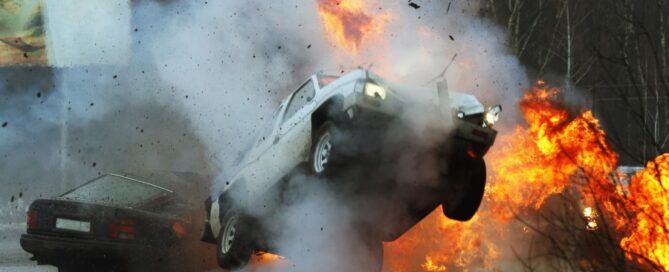 a car on fire and smoke