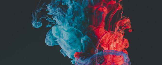 a red and blue smoke