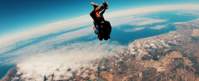 a person skydiving in the air