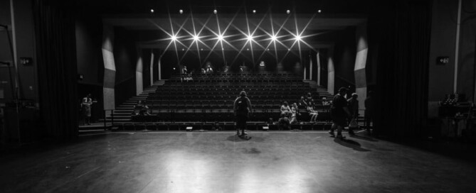 a stage with people in the back